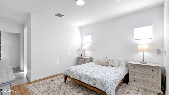 bedroom featuring light hardwood / wood-style flooring