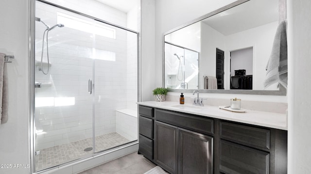 bathroom featuring vanity and walk in shower