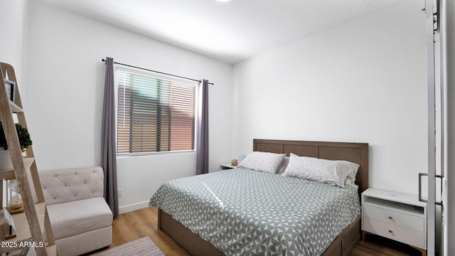 bedroom featuring hardwood / wood-style floors