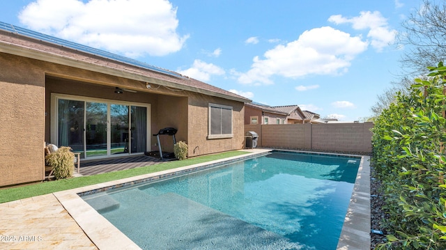 view of pool featuring a patio area