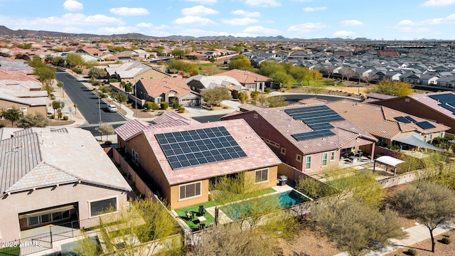 birds eye view of property featuring a mountain view