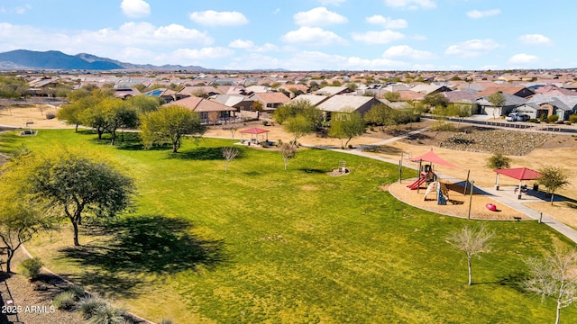 drone / aerial view featuring a mountain view