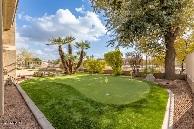 view of yard featuring a pool