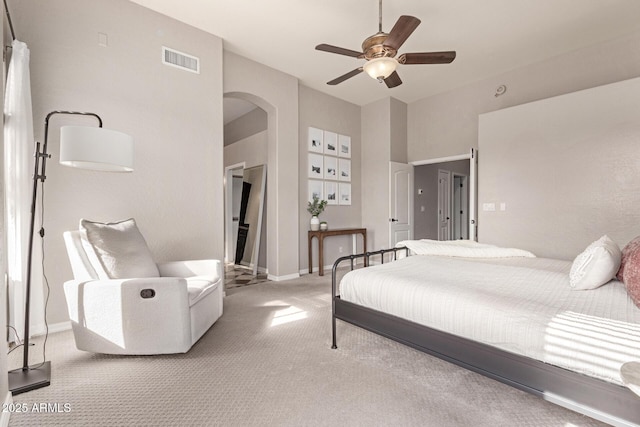 carpeted bedroom featuring ceiling fan