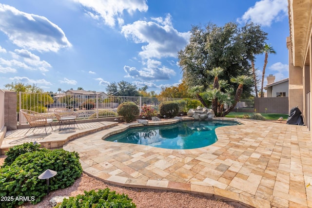 view of pool featuring a patio area