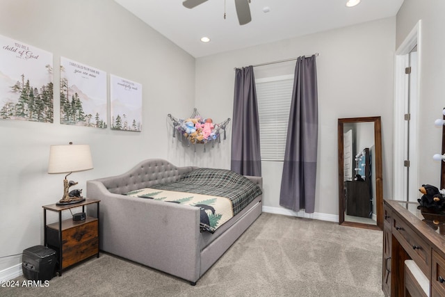 carpeted bedroom with ceiling fan