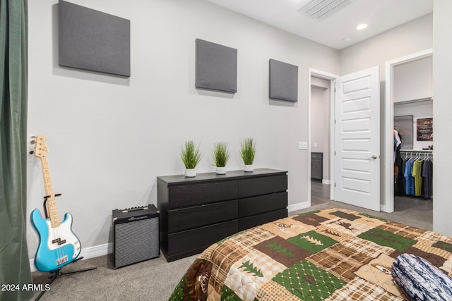 carpeted bedroom with a closet