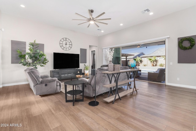 living room with light hardwood / wood-style floors