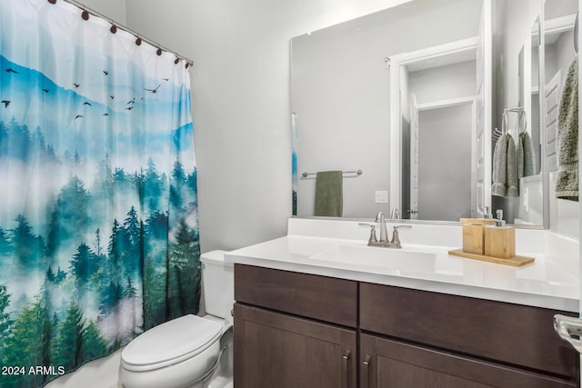 full bathroom featuring vanity, toilet, and shower / tub combo with curtain