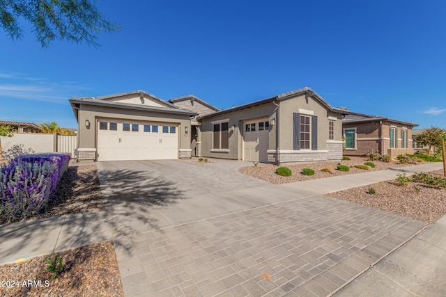 view of front of property featuring a garage