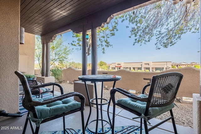 view of patio / terrace with a balcony