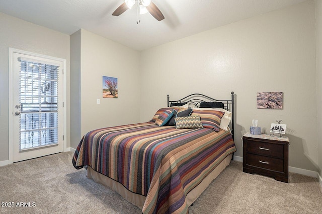 bedroom featuring a ceiling fan, access to exterior, light colored carpet, and baseboards