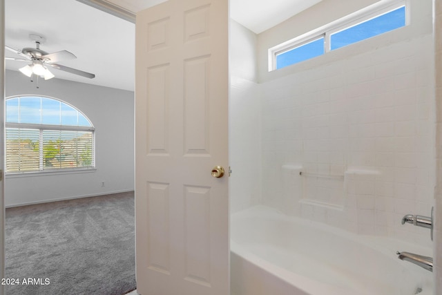 bathroom featuring plenty of natural light, tub / shower combination, and ceiling fan