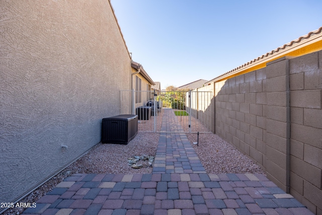 view of patio with central air condition unit