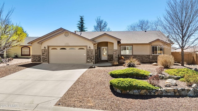 7300 Butte Vis, Prescott Valley, AZ 86315 - ranch-style house with concrete driveway, stucco siding, fence, an attached garage, and stone siding