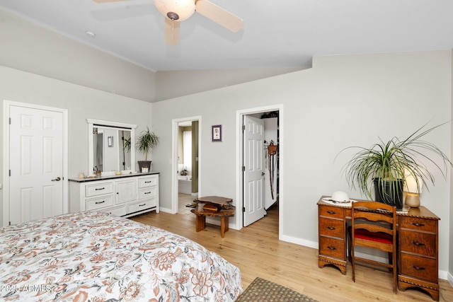 7300 Butte Vis, Prescott Valley, AZ 86315 - bedroom featuring vaulted ceiling, a spacious closet, baseboards, light wood-style floors, and ceiling fan