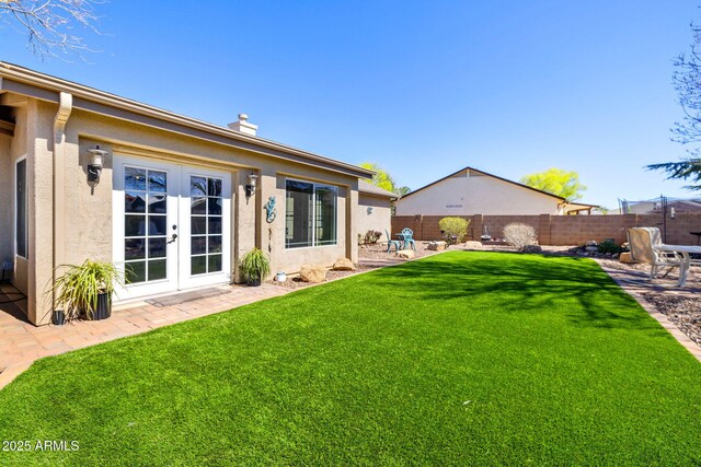 7300 Butte Vis, Prescott Valley, AZ 86315 - rear view of house featuring stucco siding, fence, french doors, a yard, and a patio area