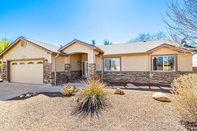 7300 Butte Vis, Prescott Valley, AZ 86315 - ranch-style home with stucco siding, a garage, concrete driveway, and stone siding