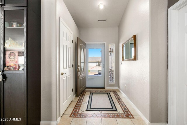 7300 Butte Vis, Prescott Valley, AZ 86315 - entryway with light tile patterned flooring, baseboards, and visible vents