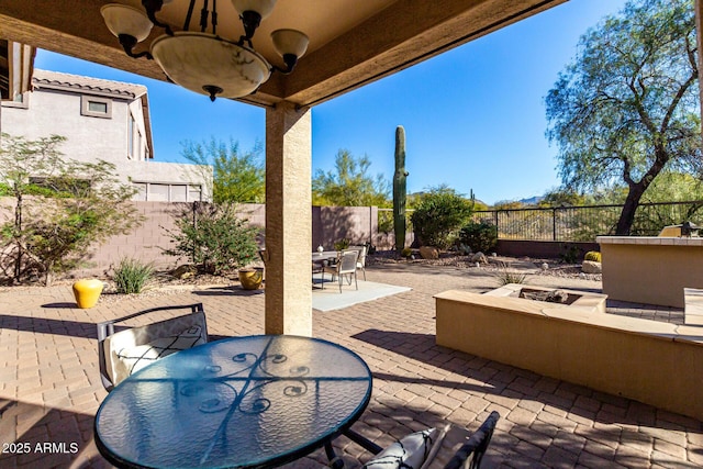 view of patio with ceiling fan