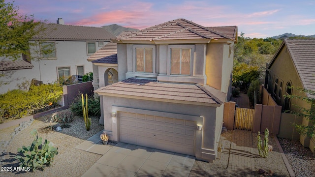 view of front of property with a garage