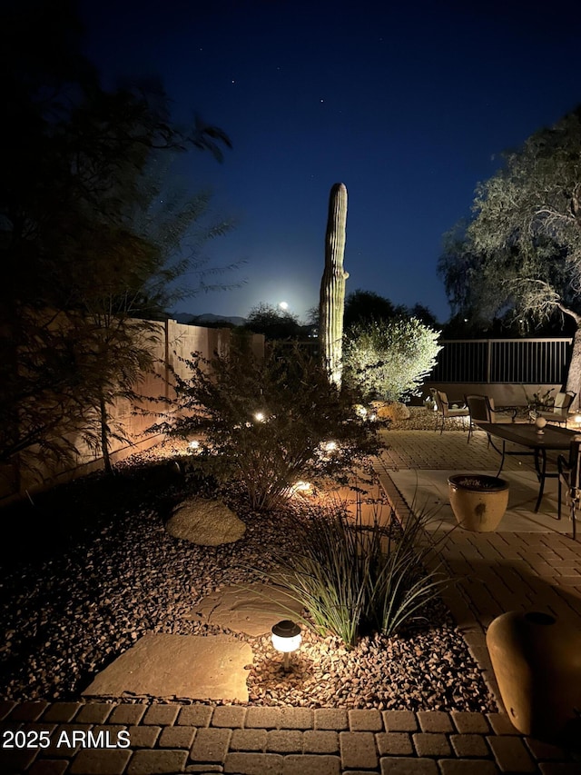 view of patio at night