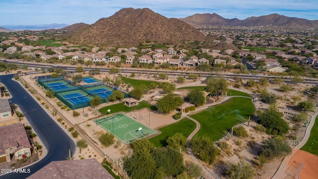 birds eye view of property featuring a mountain view