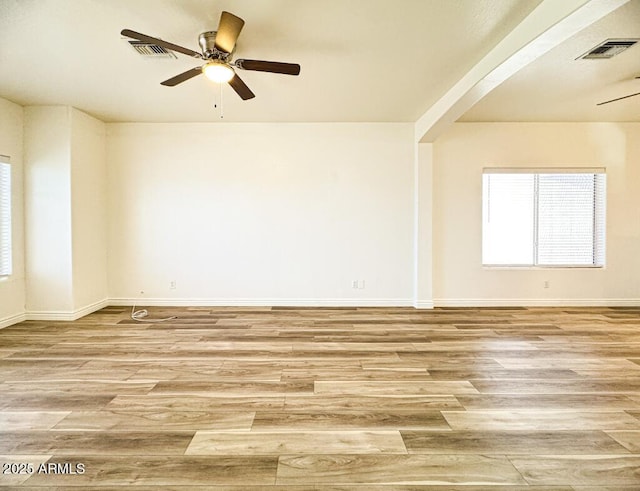 10722 W Quartz Dr, Casa Grande, AZ 85193 - unfurnished room featuring ceiling fan and light wood-style floors