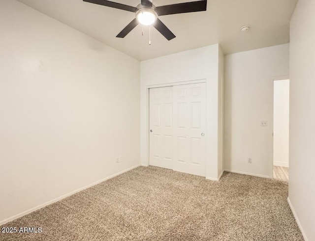 10722 W Quartz Dr, Casa Grande, AZ 85193 - unfurnished bedroom featuring carpet, a closet, and a ceiling fan