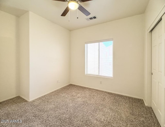 10722 W Quartz Dr, Casa Grande, AZ 85193 - unfurnished bedroom with carpet floors, a closet, and a ceiling fan