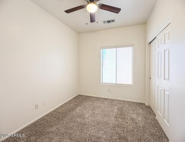 10722 W Quartz Dr, Casa Grande, AZ 85193 - unfurnished bedroom featuring carpet flooring, a closet, and ceiling fan