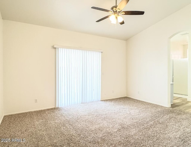 10722 W Quartz Dr, Casa Grande, AZ 85193 - carpeted spare room featuring arched walkways and a ceiling fan