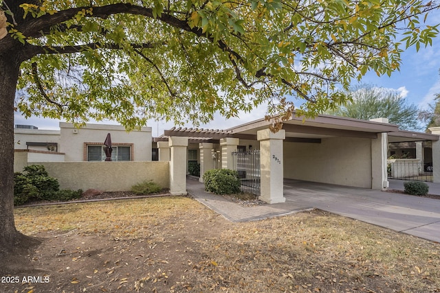 view of front of property with a carport