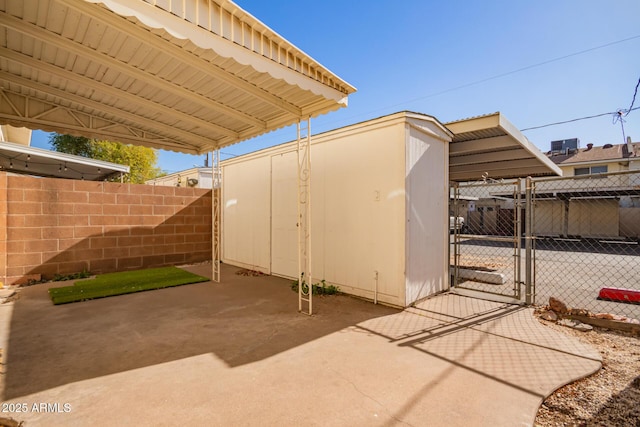 view of patio / terrace featuring a carport