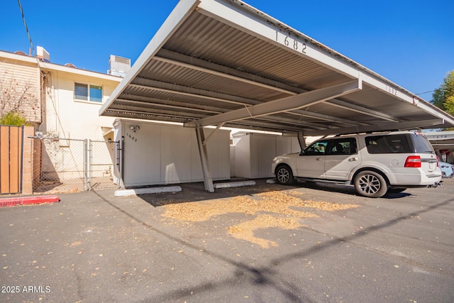 view of car parking with a carport