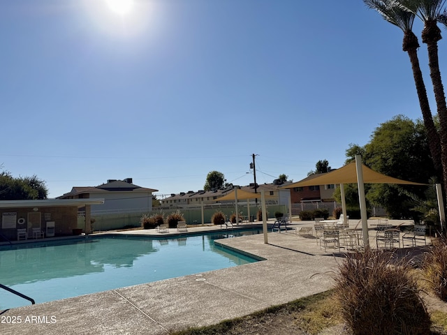 view of pool featuring a patio