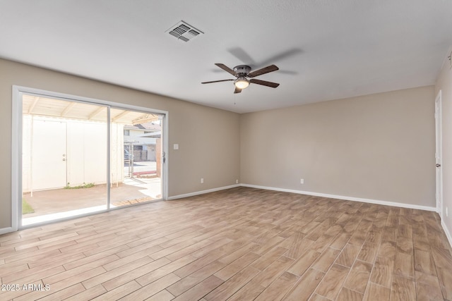 unfurnished room with ceiling fan and light hardwood / wood-style floors