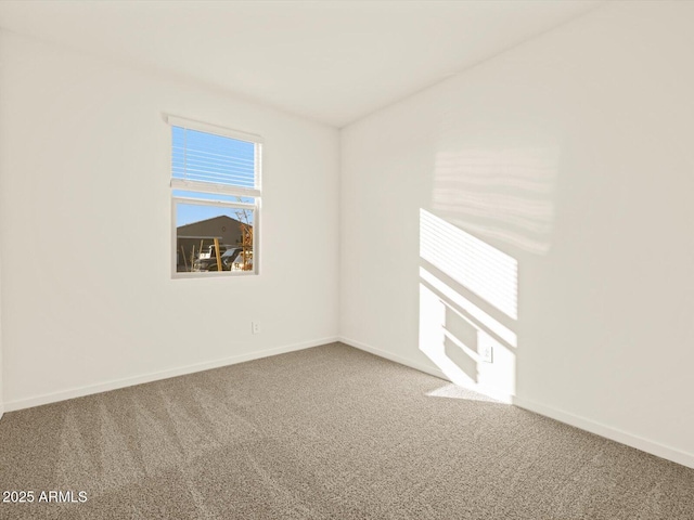 empty room with carpet flooring