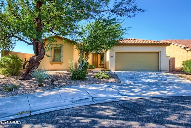 view of front of home with a garage