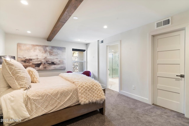 carpeted bedroom featuring beam ceiling and ensuite bathroom