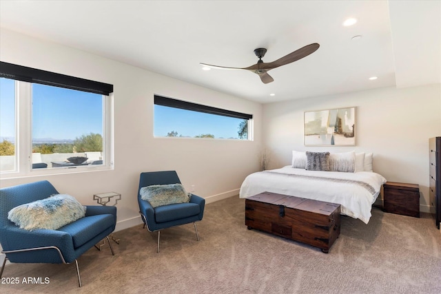 bedroom featuring ceiling fan and carpet flooring