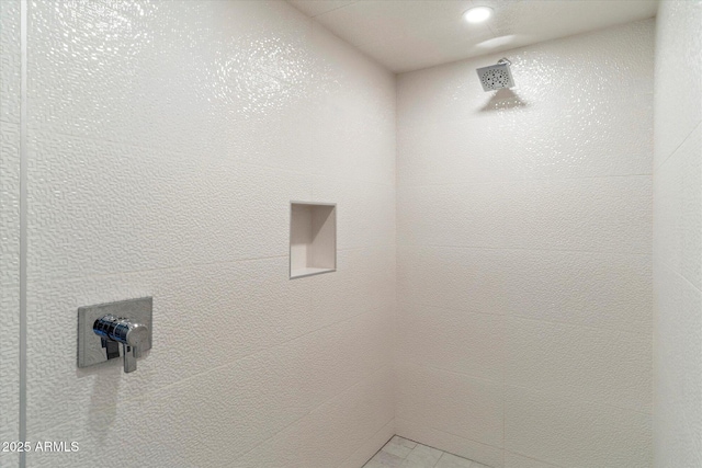 bathroom featuring walk in shower