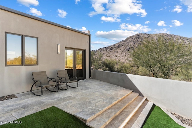 view of patio with a mountain view