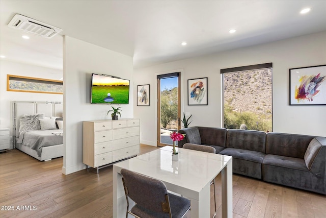 living room with dark hardwood / wood-style floors