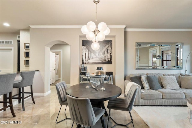 dining space featuring ornamental molding and a chandelier