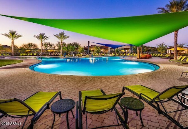community pool featuring a patio area