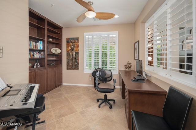 office area with ceiling fan, baseboards, and visible vents