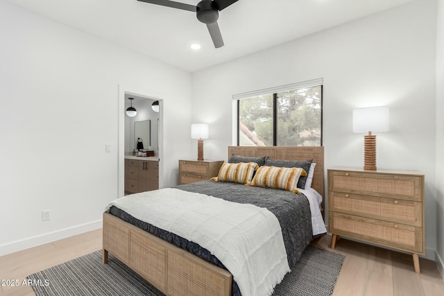 bedroom with baseboards, light wood-style flooring, recessed lighting, ceiling fan, and connected bathroom