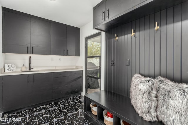 mudroom featuring a sink