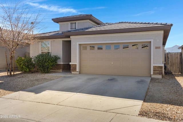 prairie-style home with a garage